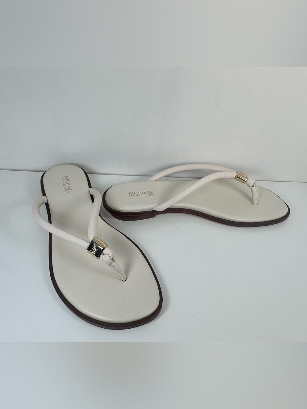 MICHAEL Michael Kors Cream/White Leather Thong Sandals with Gold Logo